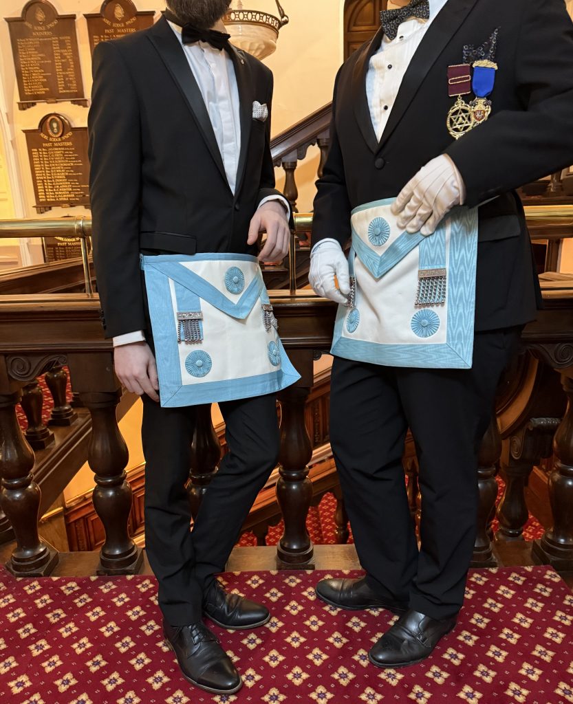 An image of Masons in evening dress & regalia.